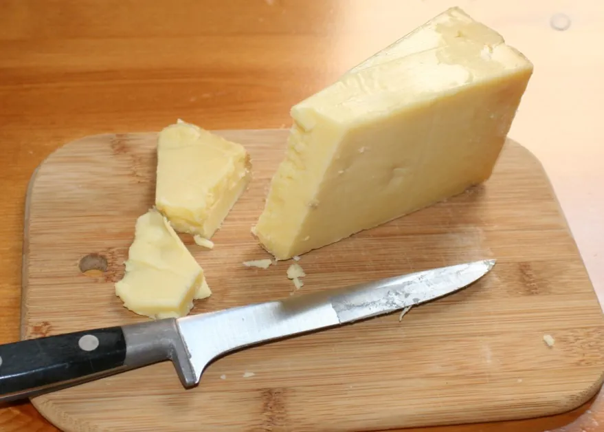A wedge of Somerset cheddar