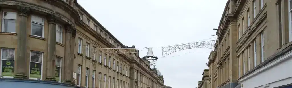 Christmas decorations above Newcastle’s market street; archive architecture view