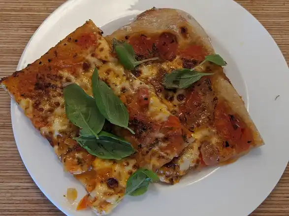 Food type: Pizza — illustrative food photograph, not a named venue product
