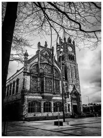 Guildhall and Shipquay Place; nearby Derry city setting, not Holiday Inn Express or a room view