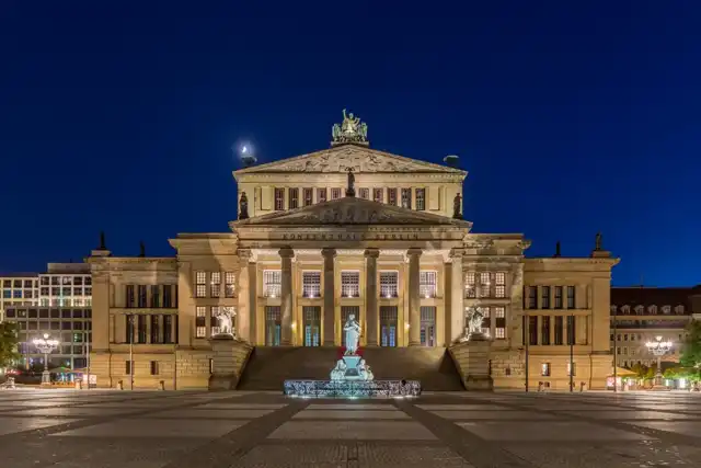 Illuminated Konzerthaus Berlin on Gendarmenmarkt at blue hour in May 2015