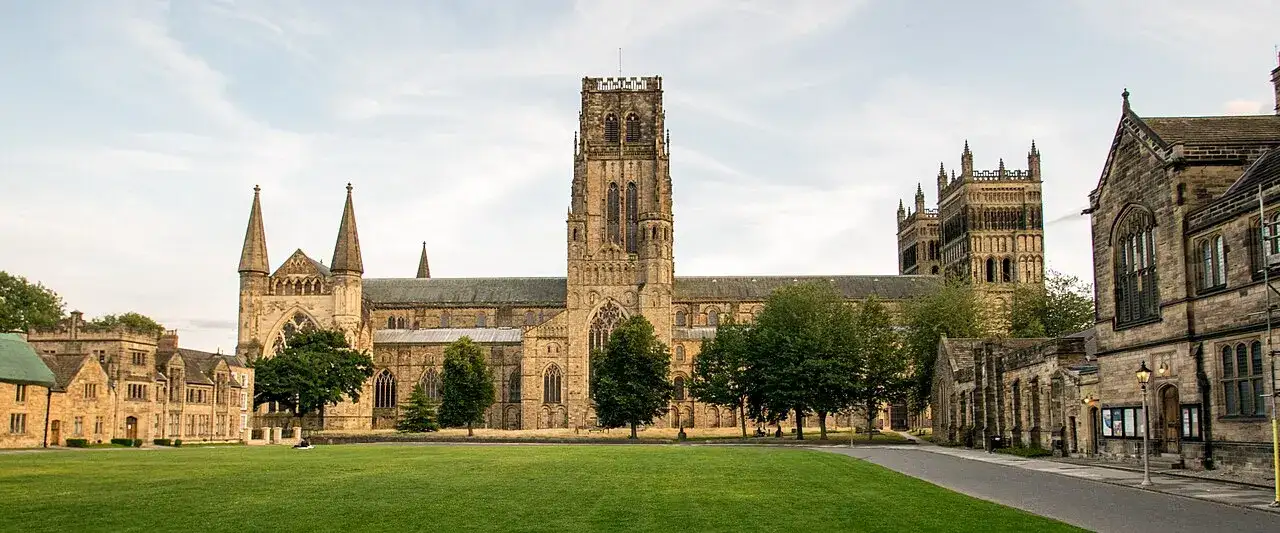 w:Durham Cathedral from w:Palace Green, with Palace Green Library to the right and Bishop Cosin's Almshouses and the Pemberton Rooms on the left