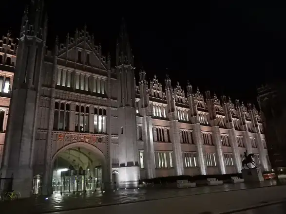 Marischal College at night, photographed in 2021; archive setting for Broad Street, not the 2026 market.